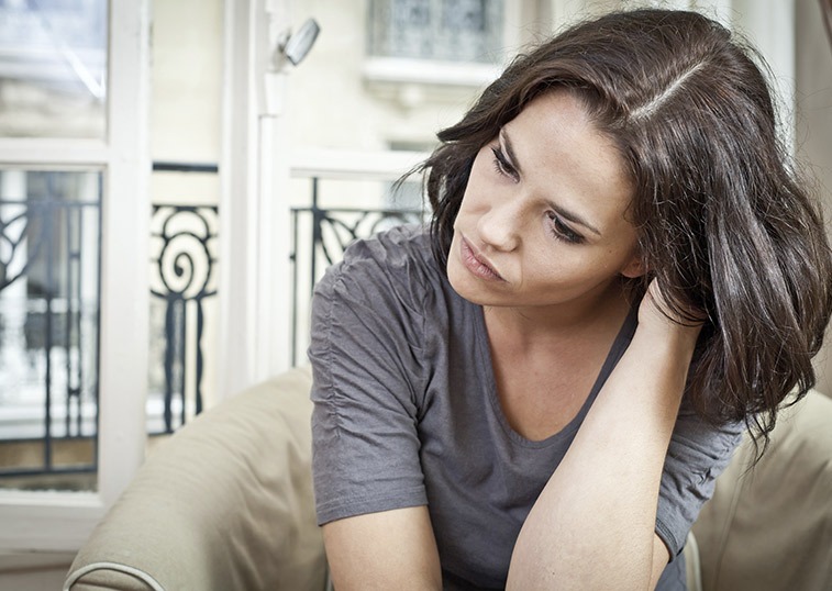 woman looking stressed