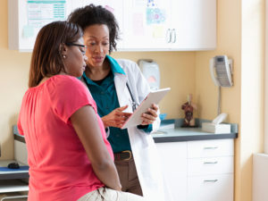 what causes preeclampsia doctor talks with pregnant patient