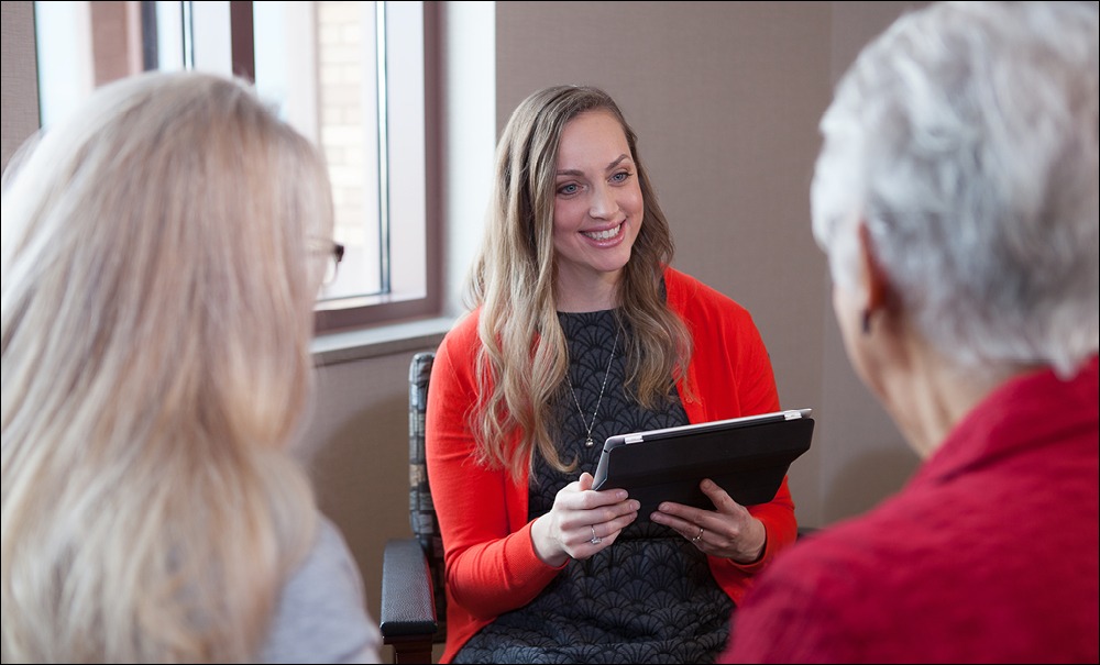 genetic counselor talking to patients