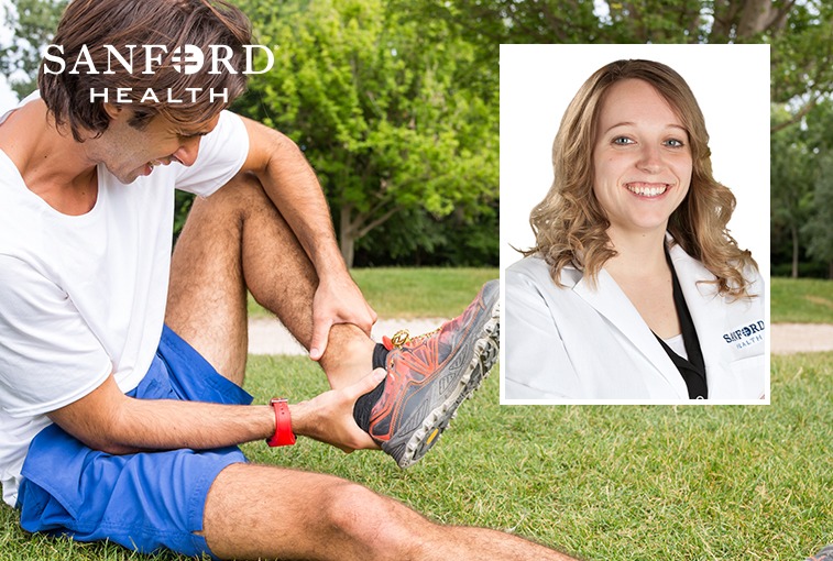 man holding ankle with joint pain