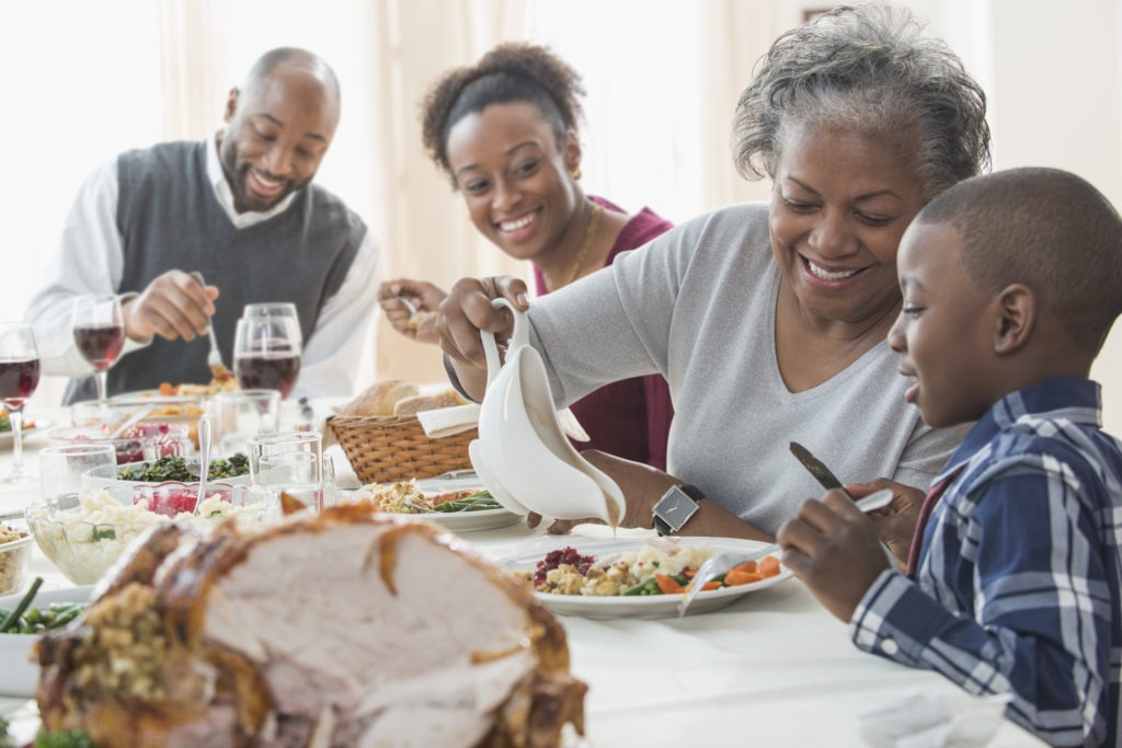 Family eating together at holiday table