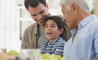 colorectal cancer screening: men and boy eating lunch