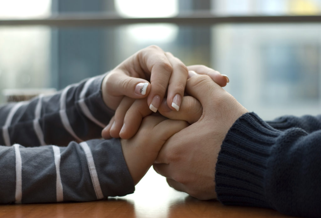 couple holding hands