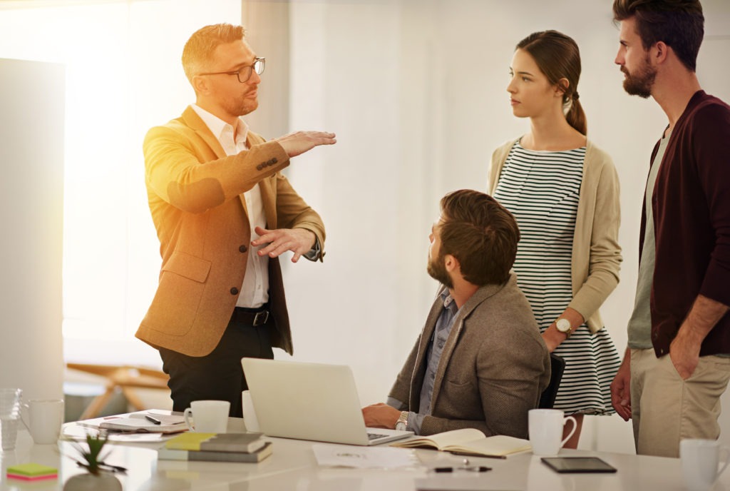 business leaders talking in a meeting