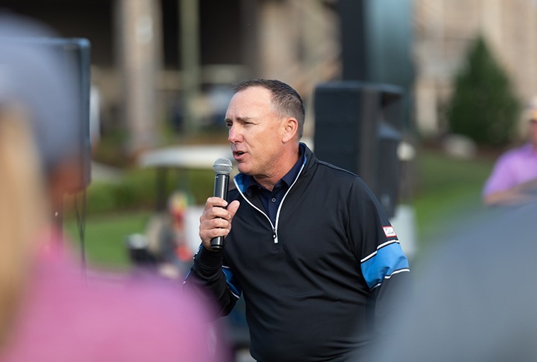Todd Kolb speaking at an event