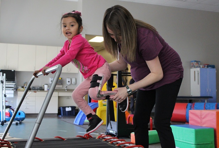 Chloe Cantu works with Sanford Health pediatric physical therapist Adrienne Wickenheiser in Fargo, N.D. 