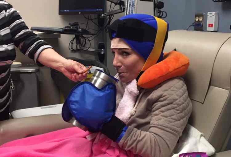 Kunkel receiving cool cap therapy during a chemotherapy treatment.