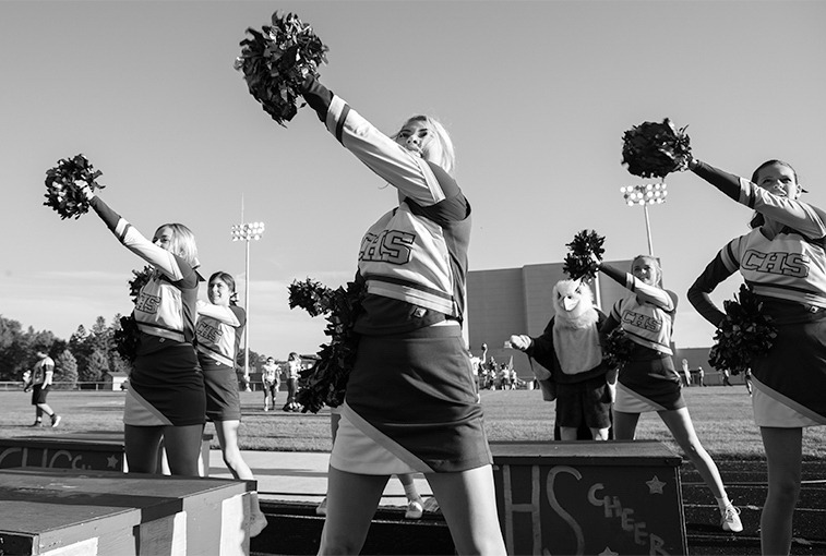 Canton High School cheerleaders help set the energy for the game on Sept. 7. 