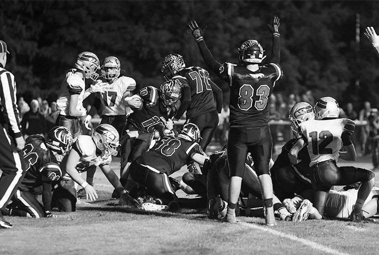 Zach Richardson signals a confirmed touchdown after Canton ball carrier Scott Peterson fights his way across the goal line in the fourth quarter of the Sept. 28 game.