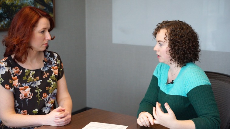 Megan Baldridge discusses her genetic test results with her genetic counselor, Erin Royer.