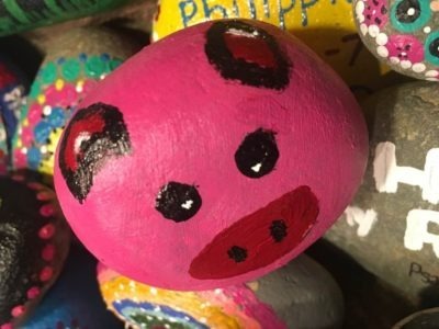 Small rock painted to look like a pig