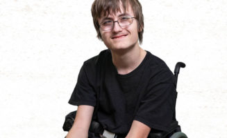 Seth Emineth, 16, smiles in a photo for the Great American Bike Race.