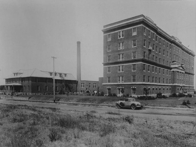 A street runs in front of the 1930 six-story Sioux Valley Hospital building.