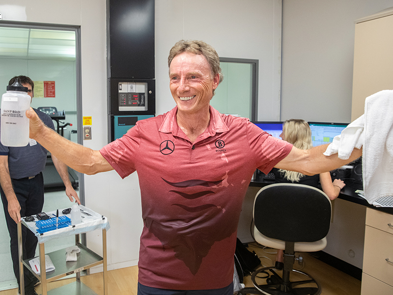 Golfing great Bernhard Langer greets a group after completing his sweat test at the Sanford Fieldhouse on Monday afternoon. 