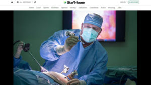 Star Tribune website screen shot with doctor in surgery.