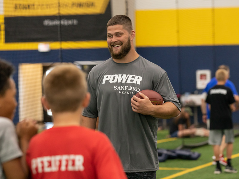 SLIDE SHOW: Philadelphia Eagles linebacker Nate Gerry chats with kids at a summer football camp at Sanford POWER.