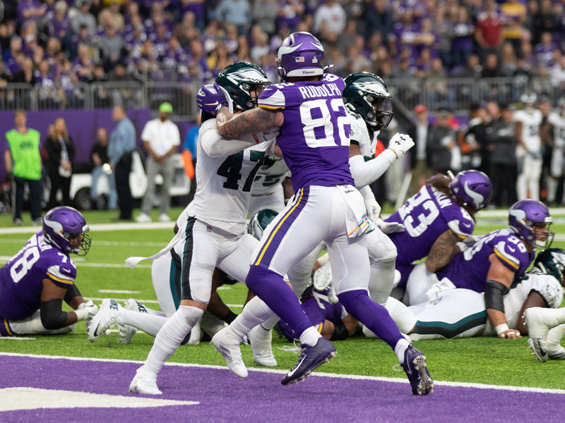 The Vikings' Kyle Rudolph (82) blocks the Eagles' Nate Gerry (47) in the end zone. (Photo by Lisa Johansen Aust, Sanford Health)