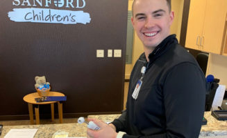 Athletic trainers, coaches help screen clinic visitors