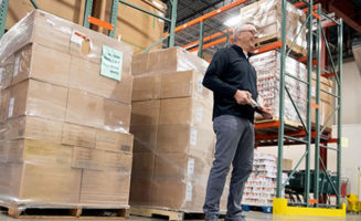 Profile by Sanford helps stock food pantry shelves