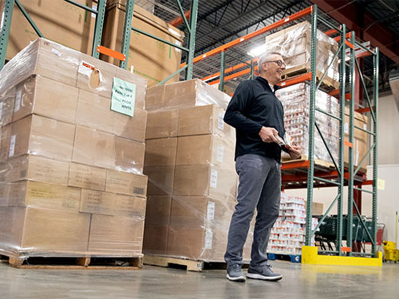 Profile by Sanford helps stock food pantry shelves