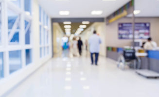 A blurred image of a hospital hallway to illustrate a story about upskilling