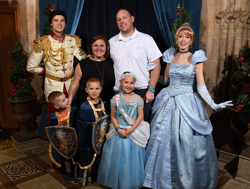 Abigail Polzin (second from left) and her family. Plus Prince Charming and Cinderella, too. (Photo courtesy of Abigail Polzin)