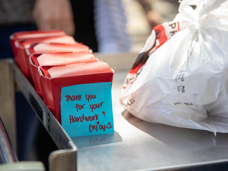 Each takeout box came with a note of encouragement. (Photo by Gabrielle Pike, Sanford Health)