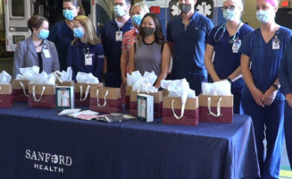 Tommy John donates 2,110 clothing items to Sanford workers