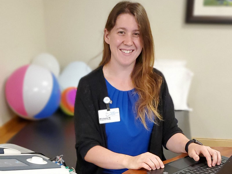 Happy rehab patient benefits from expert therapy care