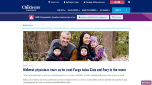 Screen shot from Children's Minnesota website with photo of family and headline "Midwest physicians team up to treat Fargo twins Cian and Rory in the womb"