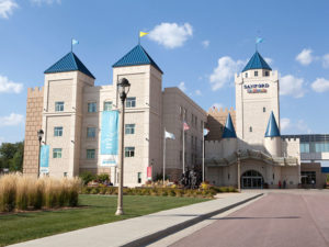 Sanford Children's Hospital is shaped like a castle with turrets, towers and banners.