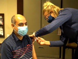 Dr. Avish receives the Pfizer vaccine