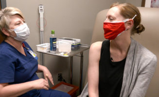 New mom and Society senior pastor gets COVID-19 vaccine