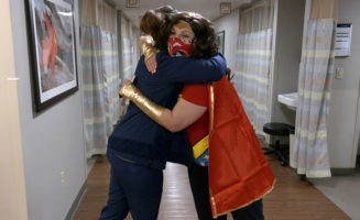 Cancer patient fights disease with superhero attitude
