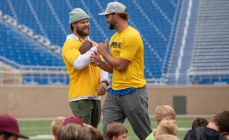 NFL stars return to home state for free youth football camps