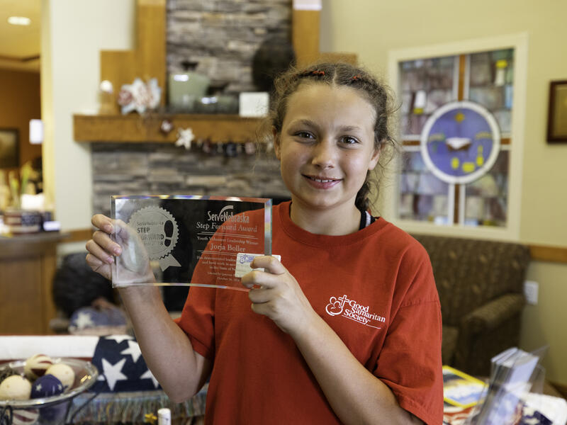 Young volunteer paints nails, brings pony to see residents