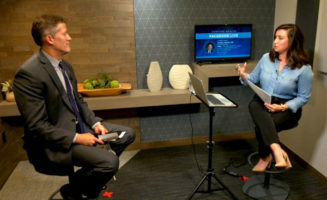 Sanford chief physician Jeremy Cauwels sits with Sanford Health News in a blue and brown studio.