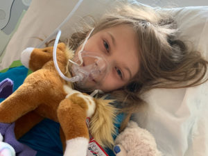 Lilah Newton in hospital bed