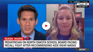 Screen shot of video from CNN, split screen with interviewer and Sanford Health pediatrician under headline "Mask wars: Pediatrician on North Dakota school board facing recall fight after recommending kids wear masks"