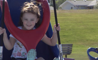 Therapists help girl with rare disorder walk on her own