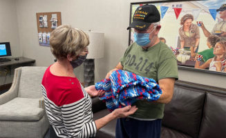 Fellow veterans, volunteers gift shawls to hospitalized vets