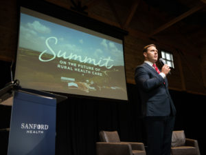 Sanford President and CEO Bill Gassen opens the rural health summit on stage