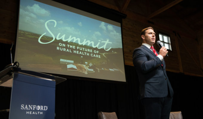 Sanford President and CEO Bill Gassen opens the rural health summit on stage