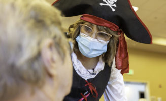 Nursing home activity director becomes characters on stage