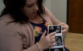North Dakota woman beats odds with identical triplets