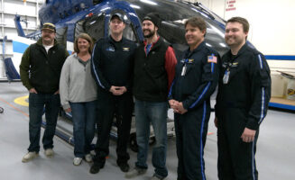 Hunter, flight crew share emotional reunion