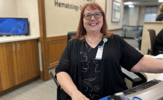 Cancer patient rep has new title: Breast cancer survivor
