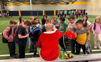 Sanford Cares program delivers backpacks to students