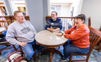 Young man leaves delivery job for senior center family
