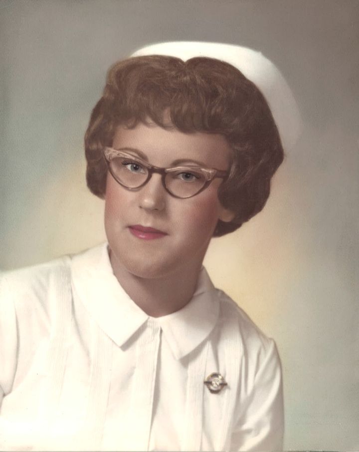 Young woman in nursing cap and uniform, 1963.
